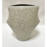 CHRIS CARTER (Born 1945) - a thrown and altered vase with textured glaze of mottled blues on cream