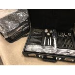 Four cased sets of Ebel knives and cutlery and a suitcase of Ebel stainless steel cutlery