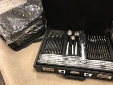 Four cased sets of Ebel knives and cutlery and a suitcase of Ebel stainless steel cutlery