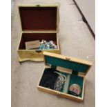 Two jewellery boxes containing various costume jewellery to include beaded necklaces,