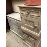 A pair of modern cream-painted bedside cupboards,