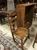 A mid-20th Century oak bookcase with gla