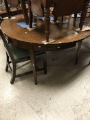 A mahogany D end dining table with addit