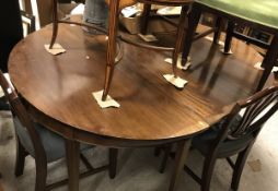 A mahogany D end dining table with addit