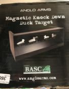 A magnetic Knockdown Duck Target game by Anglo Arms and a set of four folding knives