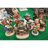 A collection of seven Geobel Hummell figures of children various