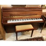 A modern mahogany cased upright piano the iron framed overstrung movement by Bentley of Stroud