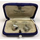 A pair of white gold and diamond cufflinks