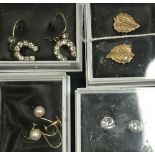 Four pairs of 9 carat gold earrings