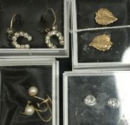 Four pairs of 9 carat gold earrings