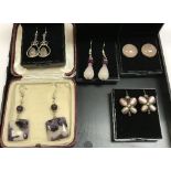 Five pairs of stone set silver earrings