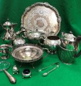 A collection of plated wares to include a three piece tea set stamped "R & B" (Roberts & Belk) to