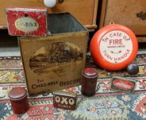 A collection of various printed decorated tins including Chadwell Biscuit shop tin, Oxo cube tin,