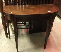 A 19th Century mahogany and satinwood strung D-shaped card table