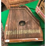 A Victorian zither with remnants of old label