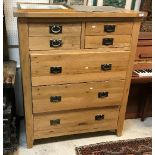 A modern oak chest of two short over three long drawers and matching two drawer filing chest