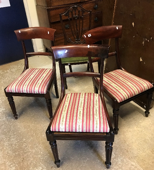 A set of four Victorian mahogany bar back dining chairs on turned and reeded legs together with two