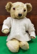 A mid 20th Century gold plush bear,