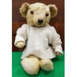 A mid 20th Century gold plush bear,