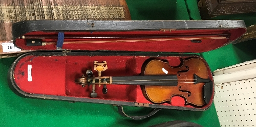 An early 20th Century child's violin in case,