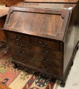 A mahogany bureau in the Georgian style