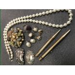 A collection of costume jewellery to include simulated pearl necklace, three pairs of earrings,