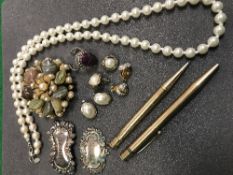 A collection of costume jewellery to include simulated pearl necklace, three pairs of earrings,