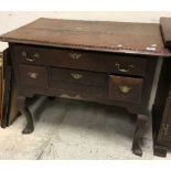 A 19th Century oak lowboy,