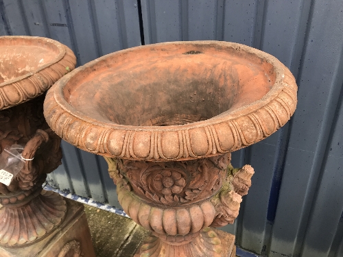 A pair of large terracotta urns on terracotta plinths CONDITION REPORTS One urn has - Image 4 of 13