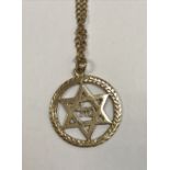 A 9 carat gold Star of David pendant with a 9 carat gold chain