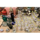 A collection of 20th Century glassware to include millefiori paperweights, a Whitefriars type vase,