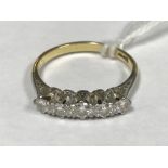 An 18 carat gold five stone set diamond ring approx. 2.