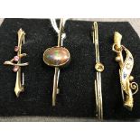 Four 9 carat gold bar brooches to include a black opal