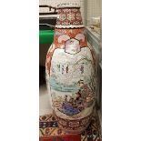 A 19th Century Meiji Period Satsuma floor vase with polychrome decorated panels depicting figures