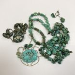 A collection of turquoise jewellery to include a carved Chinese pendant as an animal on blossom