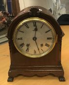 A circa 1900 mahogany cased dome top mantel clock,