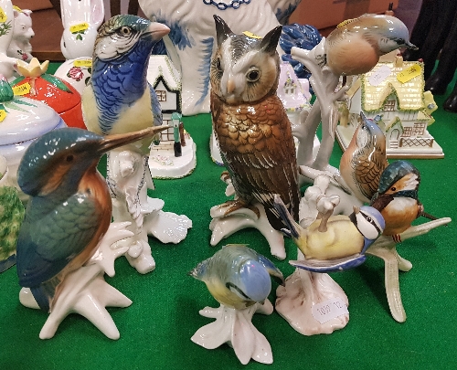 Five various Karl Ens bird figures together with a Goebel bird figure "blue titmouse" and another