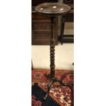 A circa 1900 mahogany torchère stand on barley-twist support to carved cabriole tripod base