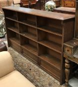 A late Victorian oak open bookcase,