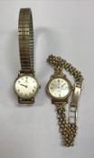 A ladies gold cased Omega Seamaster DeVille wristwatch with 9 carat chainlink strap and a ladies