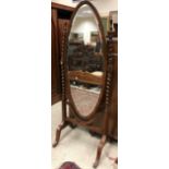An early 20th Century mahogany framed cheval mirror,