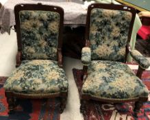 A late Victorian mahogany framed pair of ladies and gentleman's salon chairs with green foliate