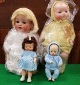 A collection of vintage dolls and teddies to include an Armand Marseille porcelain headed baby doll