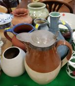 A collection of various studio pottery including pale green glazed vase inscribed "Finch" and date