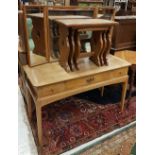A collection of furniture to include an oak nest of three occasional tables,