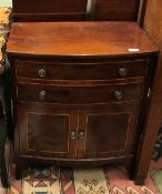 A 19th Century mahogany and inlaid commode chest of single deep drawer as two and further deep