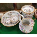A late Victorian Cauldon china six piece floral transfer decorated toilet set