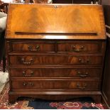 A reproduction mahogany bureau in the Georgian style by Bevan Funnell,