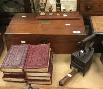 A Victorian mahogany writing slope with secret drawer to side (large split to top),