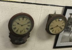 A Victorian mahogany circular wall dial, the white dial set with Roman numerals,